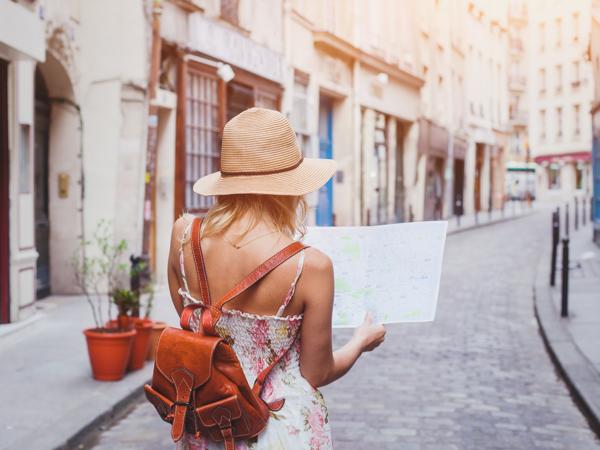 woman tourist with map in Barcelona