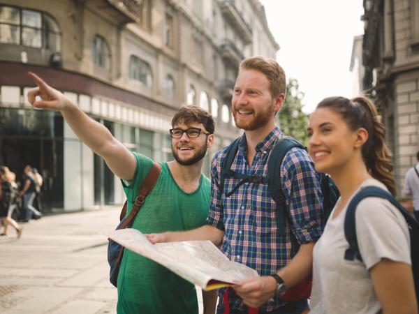 Happy Travelers with Map